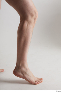 Sigvid  1 calf flexing nude side view 0003.jpg